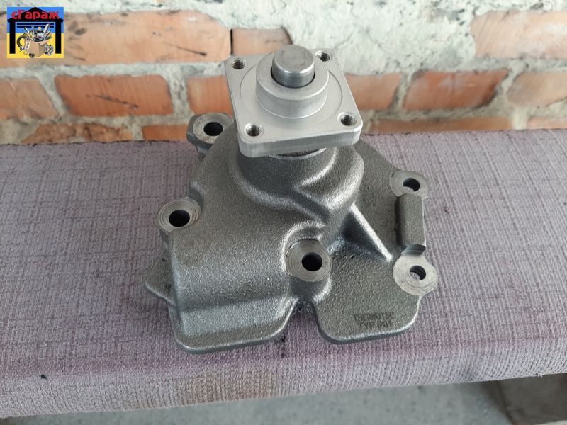 Помпа двигуна FORD TRANSIT, TOURNEO 1983-2000 (2.4D/2.5D) D1G026TT фото